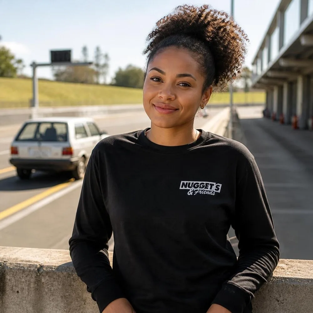 Women's Long Sleeve Tee, front, with the Nuggets and Friends chest logo