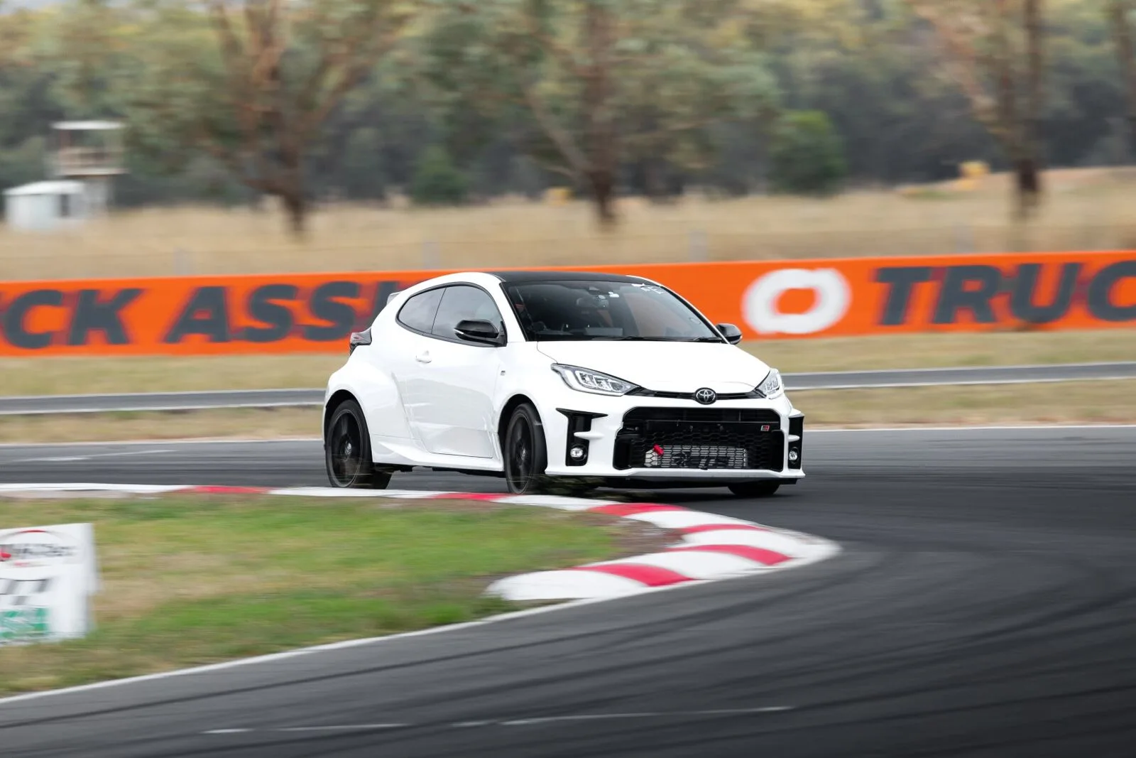 A hatchback mid-corner at Winton